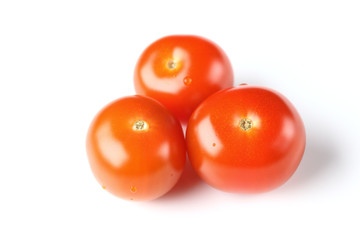 Three cherry tomatoes