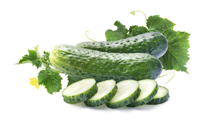 Cucumbers, pieces and leaves isolated on white