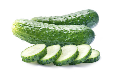 Two cucumbers and pieces isolated on white