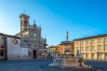 Cathedral Santo Stefano with fountain - obrazy, fototapety, plakaty