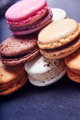 Macaroons on black slate