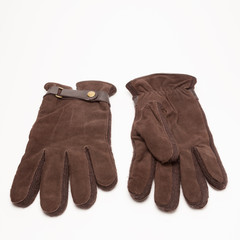 Brown velvet gloves isolated on white