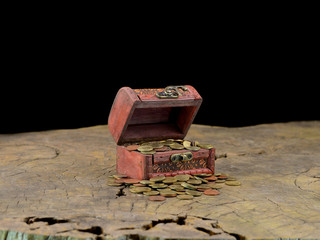 wooden treasure chest with gold coins