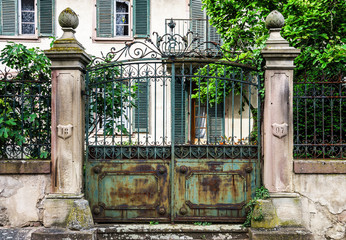 Old house gates with cast-iron lattice