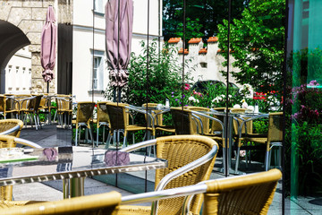 Modern mirror glass wall in traditional street cafe
