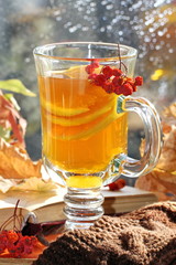 Still life with hot  tea in autumn decoration