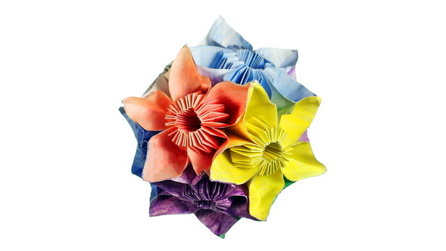 rotating colorful origami kusudama, white background