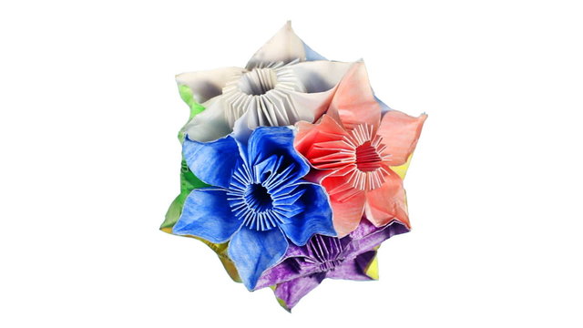 slow rotating of origami kusudama rotates, white background