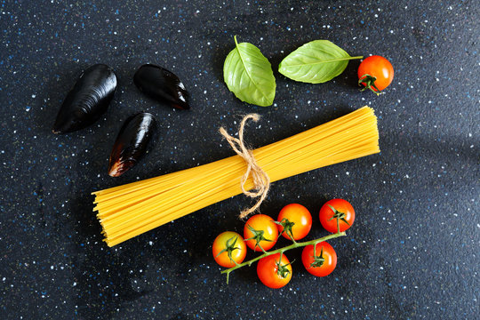 ingredients for pasta with mussels, background