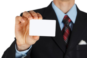 Man's hand showing business card