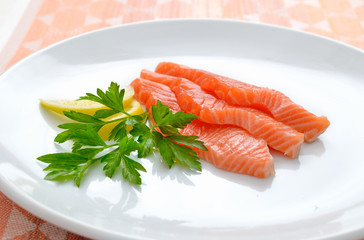 Salmon on white plate