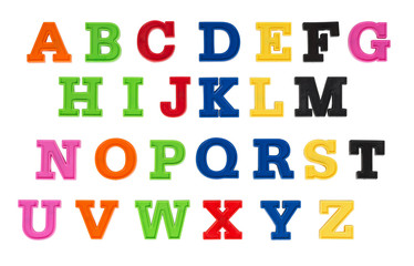 Alphabet written in multicolored plastic kids letters