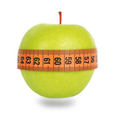 Green apple and orange measuring tape