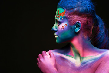 Portrait of beautiful woman with body art