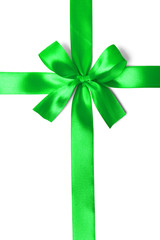 Shiny green satin ribbon on white background
