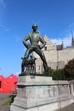 Statue of  Lange Wapper front of Het Steen, Antwerp, Belgium
