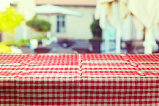 Table with red checked tablecloth