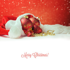 Christmas decorations on Santa hat with white copy space