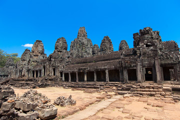 Fototapeta premium The ancient ruins of a historic Khmer temple in the temple compl