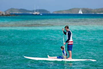 Father and son paddling