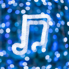 Abstract glowing musical shapes Bokeh on a colorful background