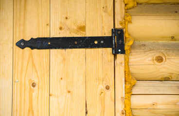 Padlock on a wooden door