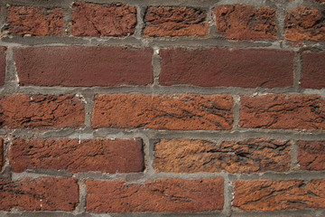 Dirty clay bricks with carbon deposits