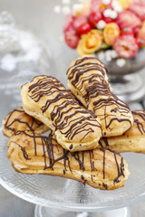 Eclairs on cake stand