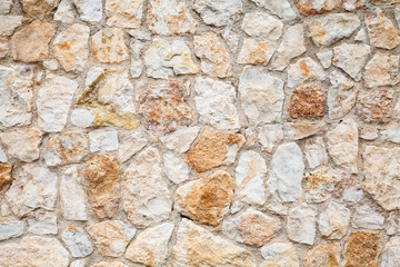 Background photo texture of yellow gray stone wall