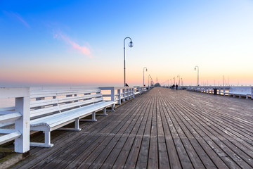 Obraz premium Sunrise at wooden pier in Sopot over Baltic sea, Poland