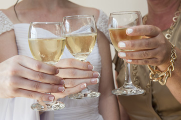 Three women drinking white wine