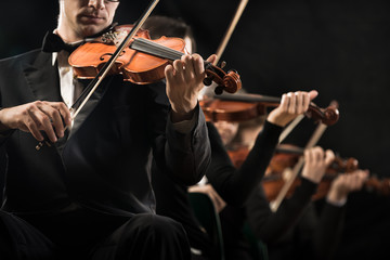 Violin orchestra performing