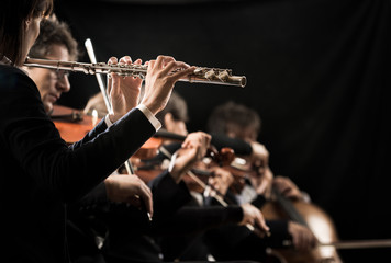Classical music concert: flutist close-up