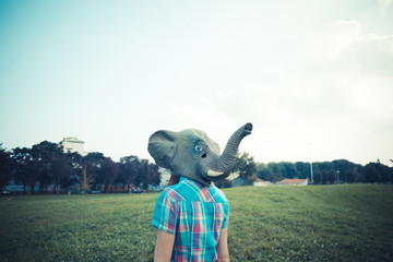 elephant mask beautiful young hipster woman