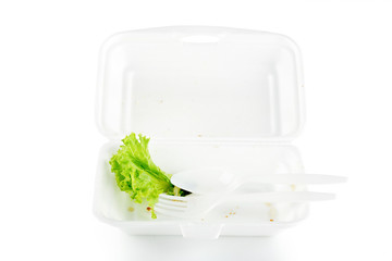 Isolates of foam boxes with scraps left over from eating