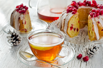 Cup of tea with Homemade glazed cranberry cake