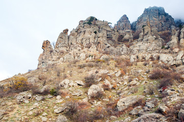 mountains under the blue sky with clouds.