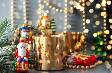 christmas decorations with golden lanterns and defocused lights
