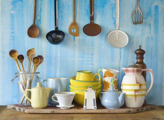 collection of vintage kitchenware, blue background © Thomas Bethge