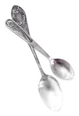 Pair of spoons isolated on white