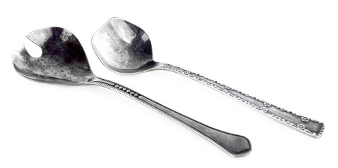 Pair of spoons isolated on white