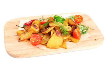 Homemade fried potato on wooden cutting board isolated on white
