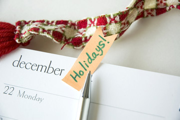 pen point to holiday note