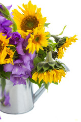 bouquet of bright sunflowers and gladioluses