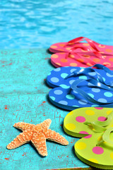 Flip Flops Starfish By Water