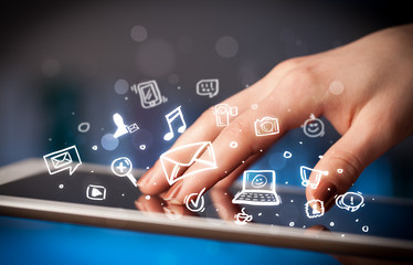 Finger pointing on tablet pc, social media concept