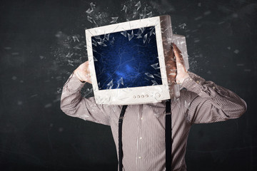 Computer monitor screen exploding on a young persons head