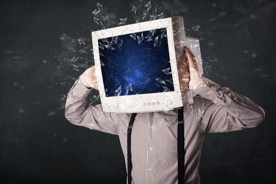 Computer monitor screen exploding on a young persons head