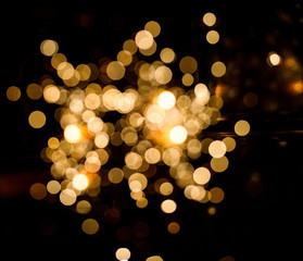 Christmas sparkler firework flame on black