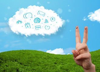 Happy smiley fingers looking at cloud with blue social icons and